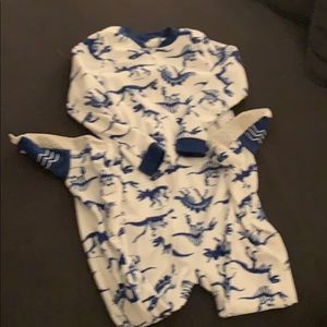 Carter’s dinosaur print fleece footie pjs. Size 7.